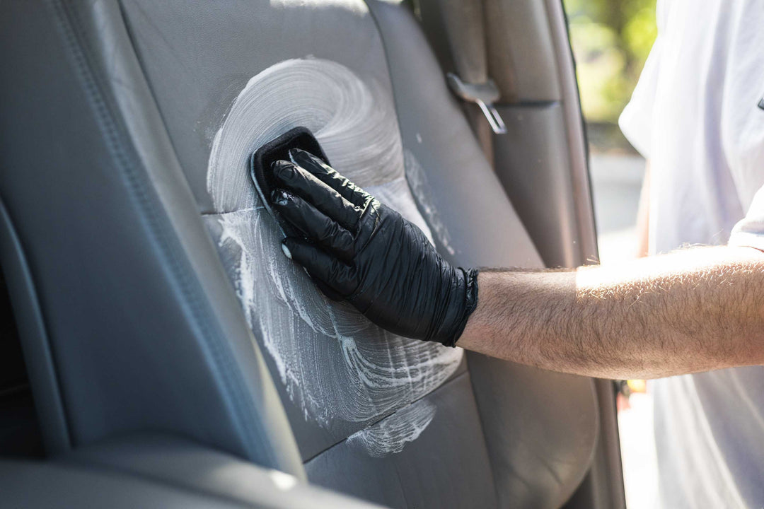The Rag Company Interior Scrubber used to clean a leather seat